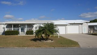 1166 WATERWAY DRIVE, BAREFOOT BAY, FL Presented by Kirby Kitchener.