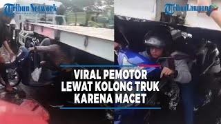 Viral Motorcyclist Passing Under Truck Due to Traffic Jam, This is the Danger #tribunlampung
