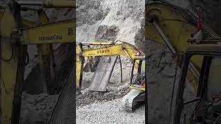 One Moving The Sand Another One Moving The Rocks