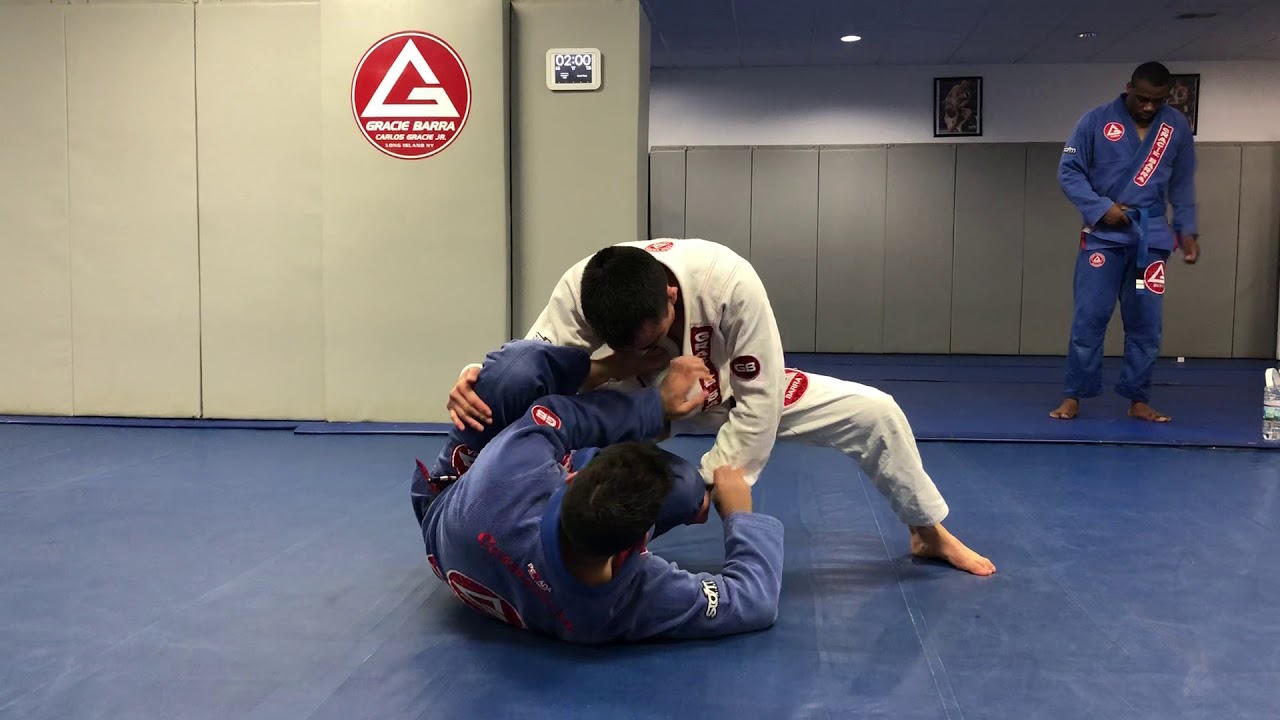 Double leg lapel sweep from reverse de la riva - YouTube
