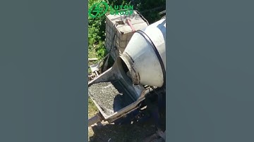 LUTON self loading Concrete Mixer with Pump Pouring Concrete At The Construction Site