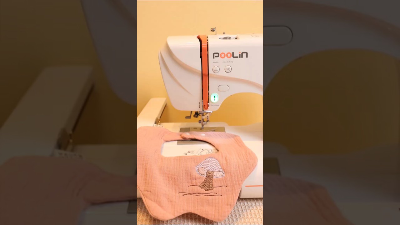 Today we embroidered a cute little mushroom on a baby bib with our embroidery machine.#shorts