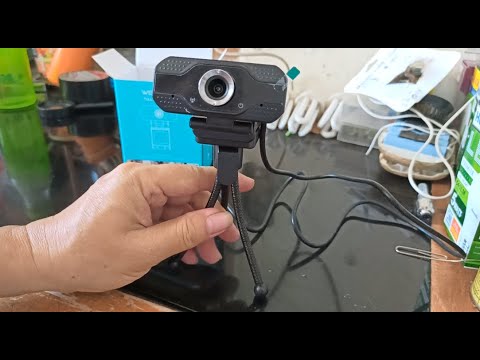 Video: Bagaimanakah cara saya memasang pemacu kamera web?
