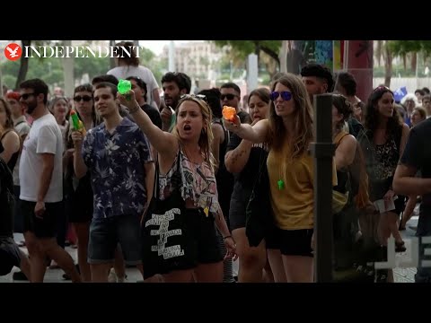 Spanish protesters squirt