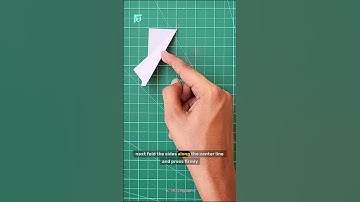 Hoe je van een plaknotitie een vliegende dartpijl maakt