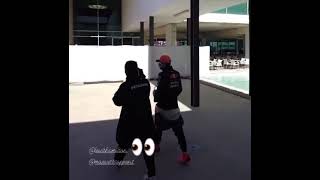 Lewis Hamilton and Max Verstappen walk together to interview pen...