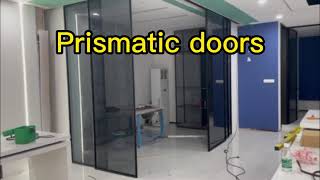 Automatic prismatic doors, easily divide a space with corner meeting doors. LEADER Automatic Door.