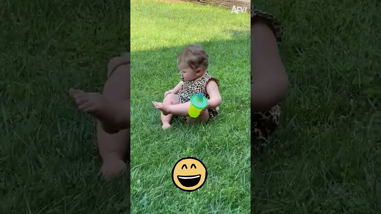 Baby's cute interaction with the grass #shorts #shortsfeed