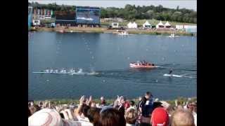 Water Skier being pulled by a rowing boat