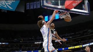 Branden Carlson with a powerful poster dunk on Zeke Nnaji