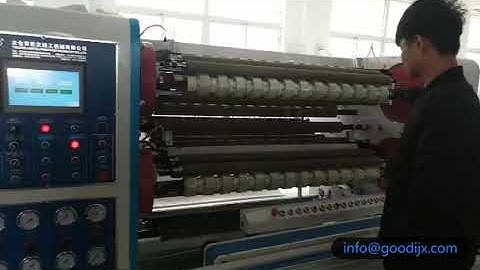 Automatic bopp tape slitting machine with auto paper core loading and unloading device.