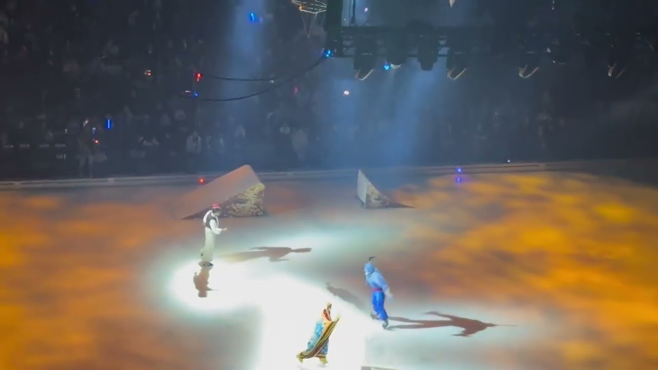 Aladdin and Genie/ friend like me from Disney on ice magic in the stars