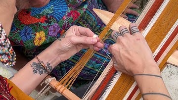 Chocoy (string heddle) setup practice on a backstrap loom