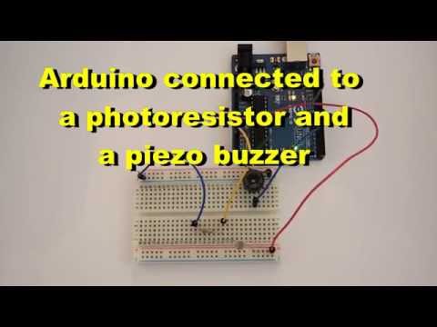 Arduino connected to a photoresistor and a piezo buzzer