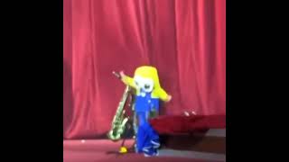 Kid in minion costume gets yoinked behind curtains