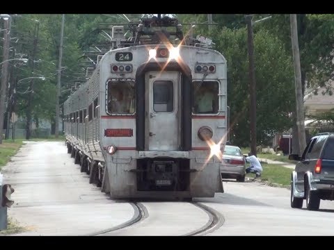 American Passenger Trains Runs Down Middle of Street! - Chicago South Shore and South Bend Railroad streetrunning on 10th St. in Michigan City on 8/8/12.