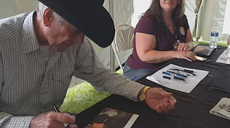 Robert Fuller signing two of my art photos