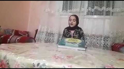 التلميذة هاجر بلغمي👩‍🎓المستوى الثالث إبتدائي خلال مشاركتها في مسابقة القرآن الكريم