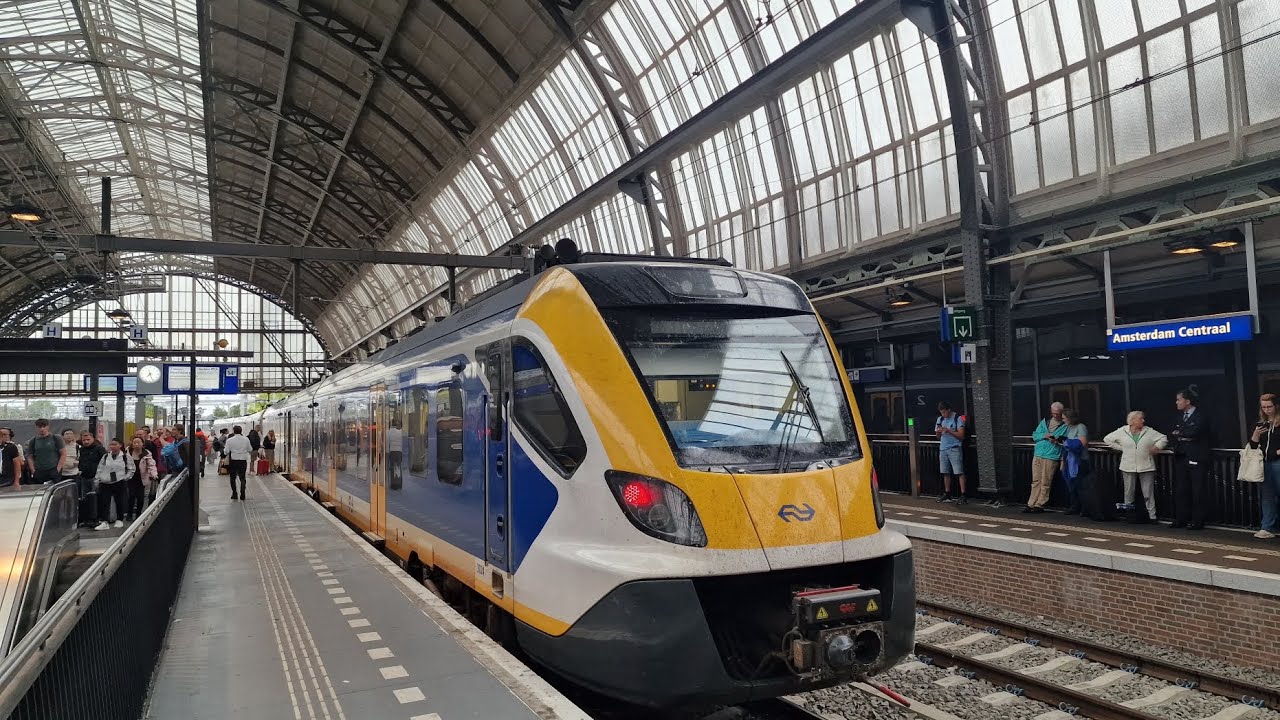 Sprinter ride from Amsterdam Schipol airport to Amsterdam Centraal. Window view