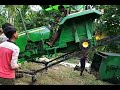 tractor climb to the harvester....