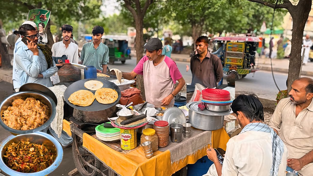 BILLA SELLING CHEAPEST DESI NASHTA AT ROADSIDE - ALOO PARATHA WITH SAAG & VEG - STREET FOOD PAKISTAN