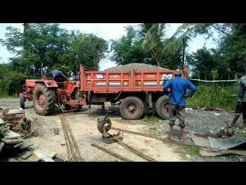 Incredible heavy machinery lifting tracked dumper off train tunnel moved by  powerful Scania XT 