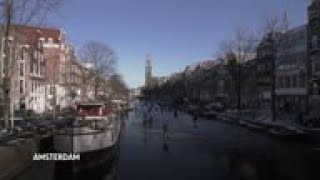 Skaters revel in Netherlands' frozen canals, lakes