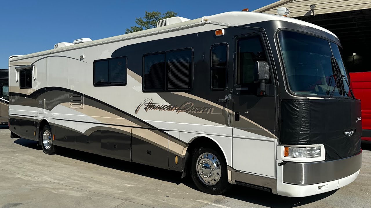 1997 AMERICAN DREAM SPARTAN SIDE RADIATED,  WALNUT CABINETRY. $39,950