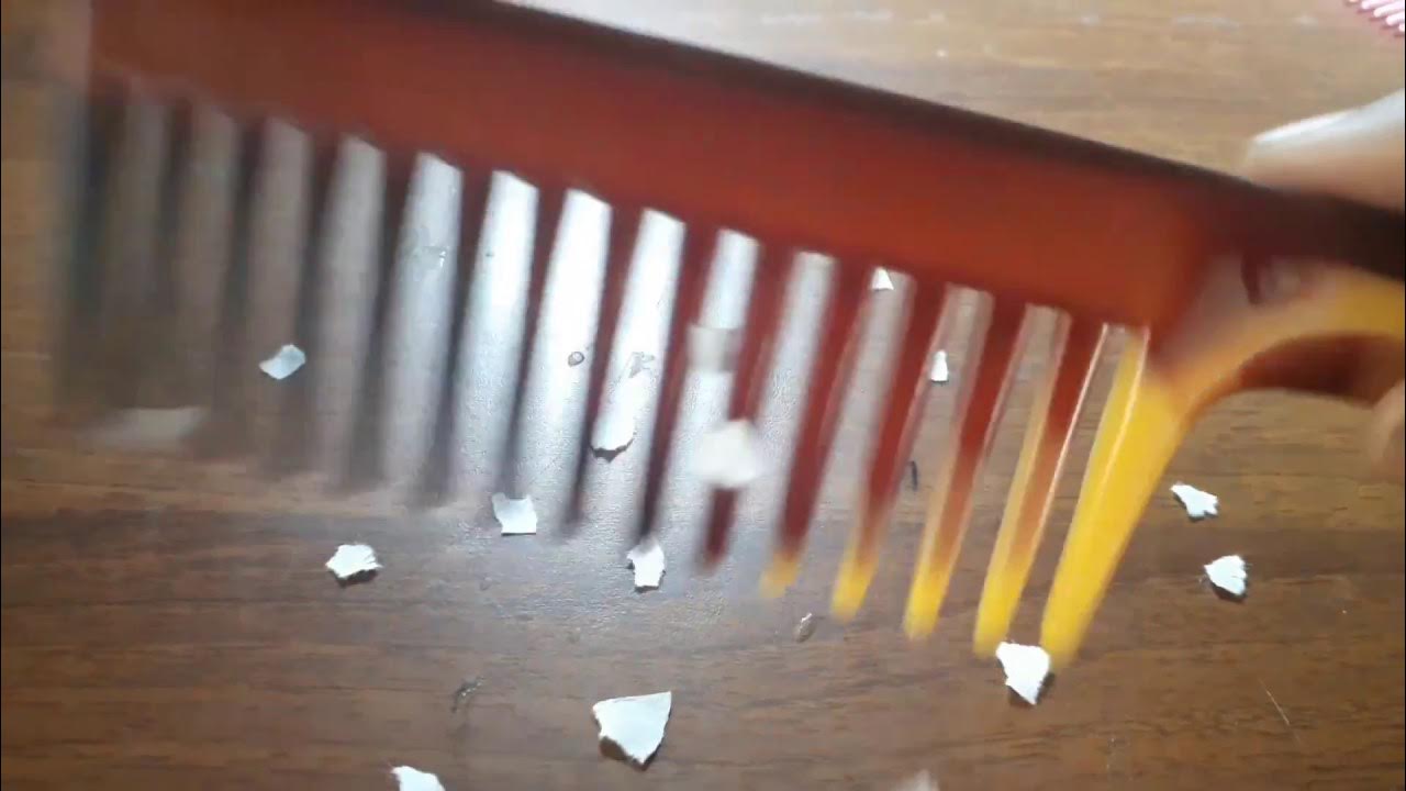 What happens when plastic comb is rubbed against dry hair and