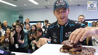 Robert Kubica vs George Russell in the Läderach Chocolate Challenge!