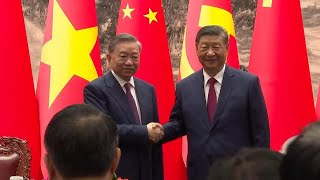 China and Vietnam agree to build closer partnership as Xi hosts new leader on first overseas visit