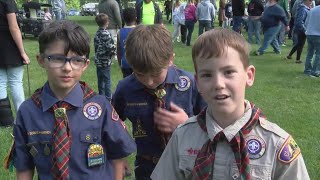 05 22 2025 Hundreds of volunteers place American Flags on headstones of veterans at the National Cem