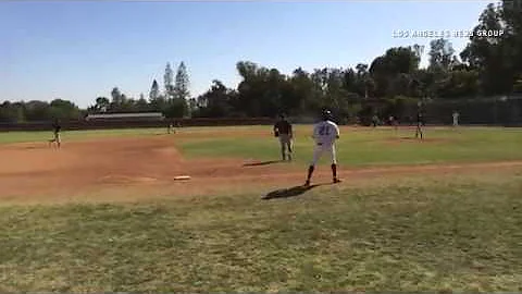 La Serna's Curtis Ashton singles in the fifth inni...
