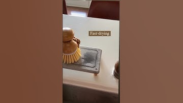 Transforming my kitchen cleanup game with the practicality and charm of a drying stone sink caddy.