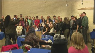 Dozens of people on parole, probation graduate from reentry program