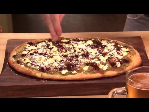 Salsa verde pizza with chorizo and goat cheese, from the video