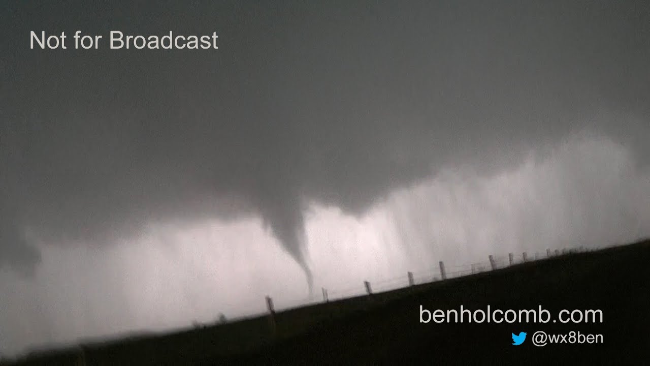 Crazy storm chasers drive into a field to escape tornadoes - YouTube