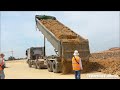 Dumping a load of dirt with dump truck trailer | truck spreading gravel ចាក់ដីធ្វើគ្រឹះផ្លូវ