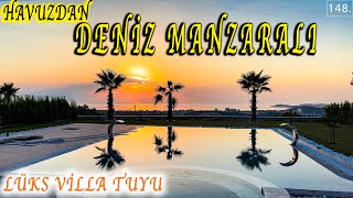 HAVUZDAN BİLE DENİZ MANZARALI  1177 m2 Arsa içerisinde Satılık Villa Turu Kuşadası