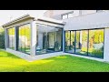 Transformation d'une terrasse avec piscine en espace détente avec Menuiserie Aluminium Cortizo