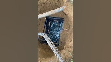 Unclogged pipe from septic tank to D-box