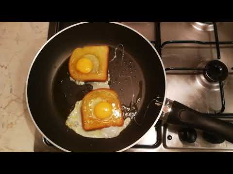 Video: Uova Fritte In Toast - Una Ricetta Graduale Con Una Foto