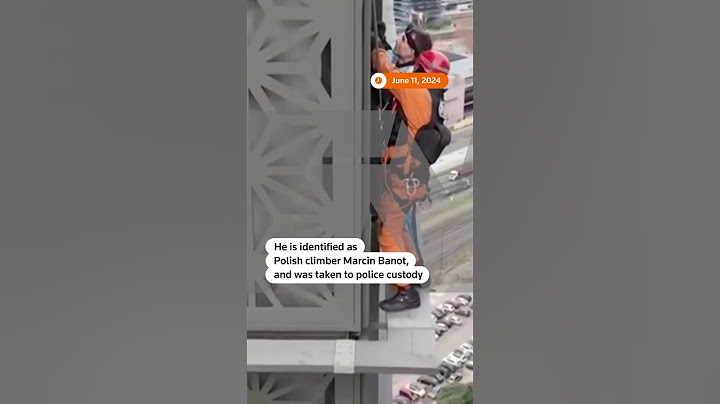 Man tries to climb Buenos Aires building without ropes | REUTERS