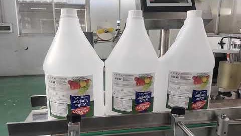 Auto fix position big round handle bucket wrap-around labeling machine for the special position