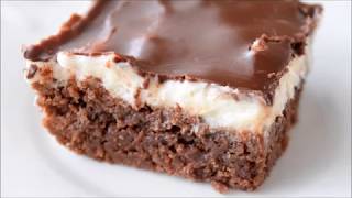 Decadent fudgy homemade brownies, slathered with a creamy white
frosting and topped thin layer of chocolate glaze. yum!
*********************read belo...