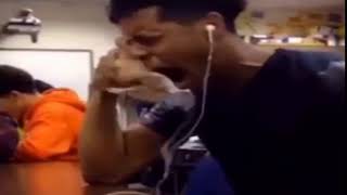 Black guy crying to music