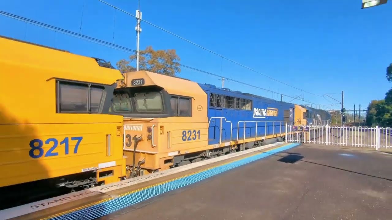 Freight Train passing Carlton Station