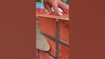 The process of installing bricks by spreading the cement evenly #shorts