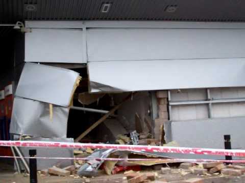 In the early hours of Wednesday Morning 10th March 2010 raiders drove a Mechanical digger into the cash machine wall of the Sainsbury`s store in Croydon , Purley Way destroying the corner of the building. The raiders sped away in two vehicles failing to grab their intended loot