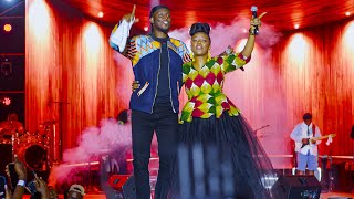 Pompi and wife Esther chungu performing together live in uganda at alive in the park concert